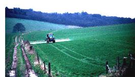 John Chilton, BGS © NERC 1998 - a tractor applying pesticide